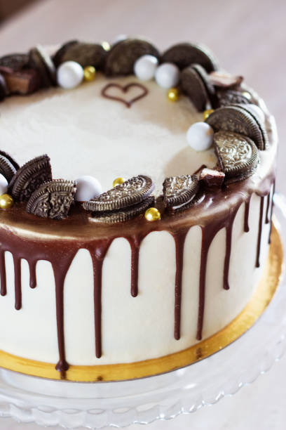 istock holiday cake with chocolate on a table on a light background 1199269084