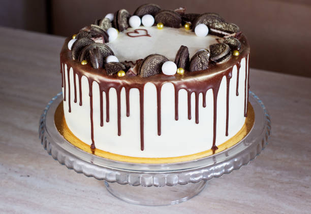 istock holiday cake with chocolate on a table on a light background 1199269089