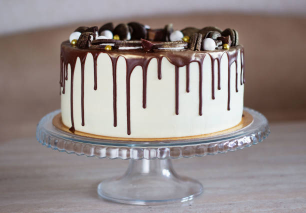istock holiday cake with chocolate on a table on a light background 1199269090