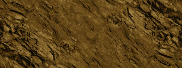 Brown grunge background. Mountain texture backdrop. Close-up.