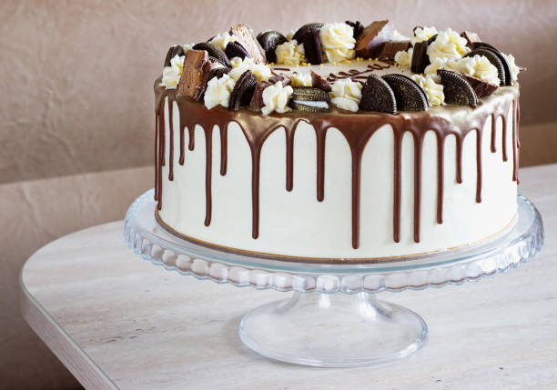 istock holiday cake with chocolate on a table on a light background 1199269157