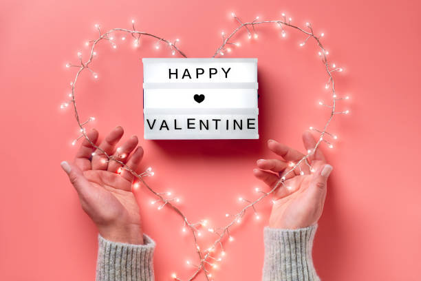 istock Valentine flat lay, top view on pink background. Lightbox with text 
