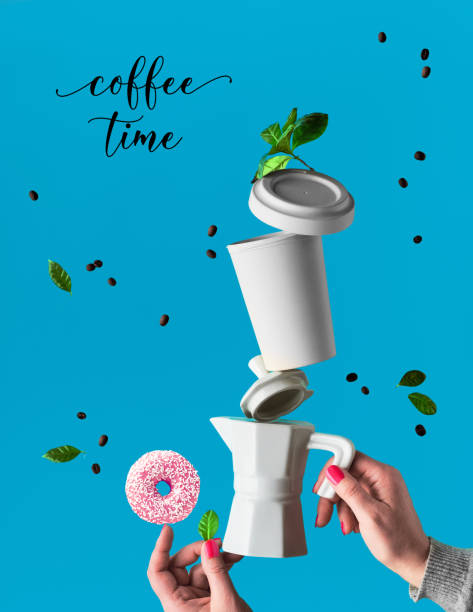 istock Trendy levitation. Flying line of coffee beans between ceramic coffee maker and espresso cup with saucer. Pink doughnuts balance on finger. Blue mint background with palm leaves and text coffee time.. 1199272845