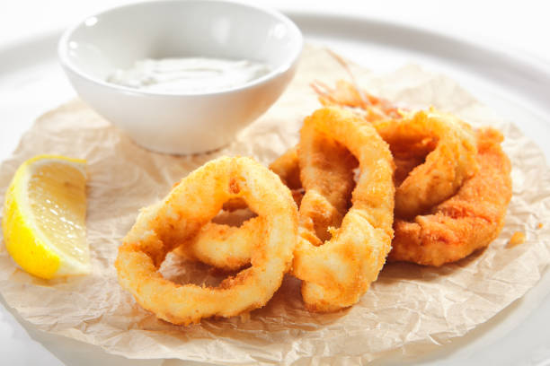 istock Breaded Fried Squid Rings and Shrimp with Tartar Sauce 1199274409