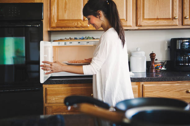 istock Woman cooking in the kitchen 1199276225