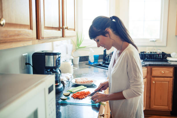 istock Woman in the kitchen 1199276363