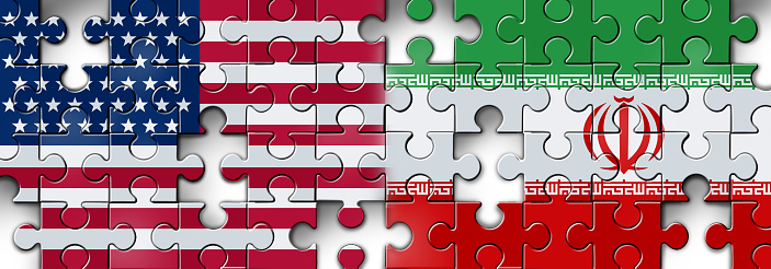Iran US showdown and middle east clash as a USA or United States crisis in the Persian gulf puzzle concept as an American and Iranian security problem due to sanctions and nuclear deal as a 3D illustration.