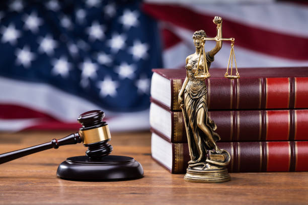 istock Gavel Near Books With Golden Scale 1199279863