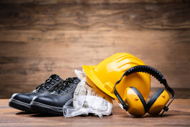 istock Yellow Hard Hat With Safety Equipment 1199279947