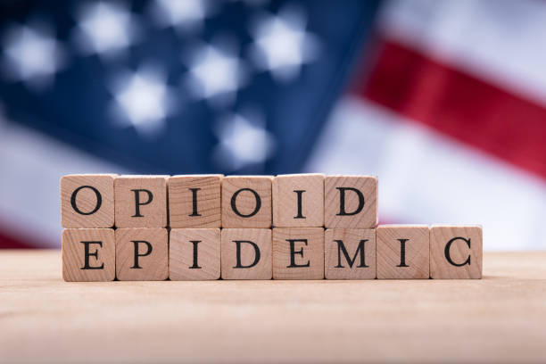 istock Opioid Epidemic Text On Cork Over American Flag 1199279956