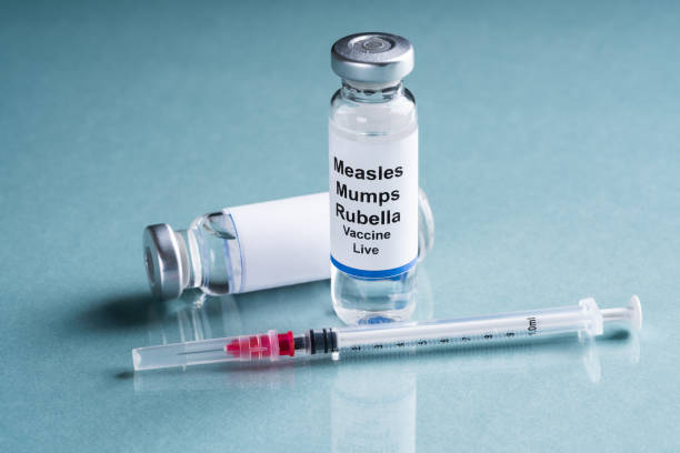 istock Measles Mumps Rubella Vaccine Vials With Syringe 1199279967