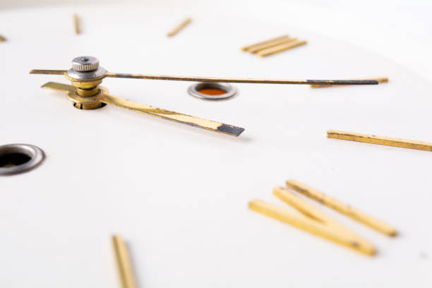 istock dial with gold Roman numerals 1199280441