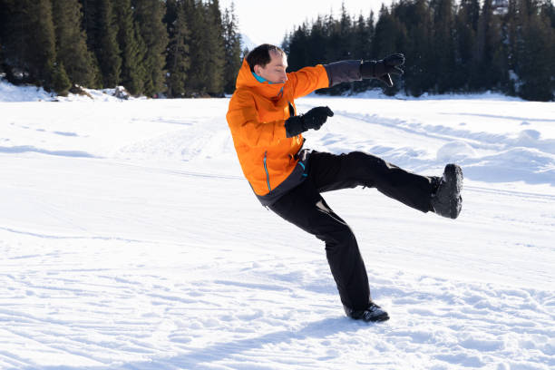 istock Man Falls On Slippery Road In Winter 1199280475