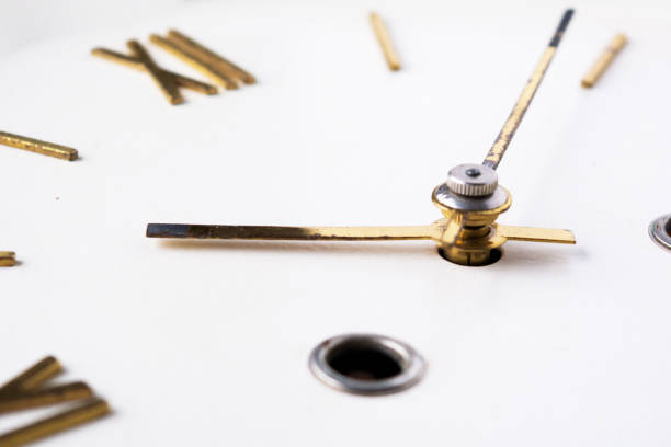 istock dial with gold Roman numerals 1199281249