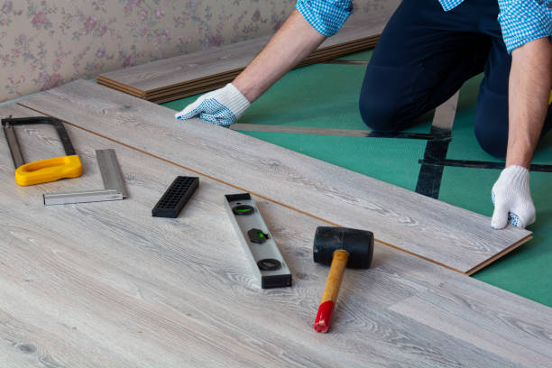 istock man installs new laminate flooring 1199281869