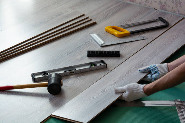 istock man installs new laminate flooring 1199281934