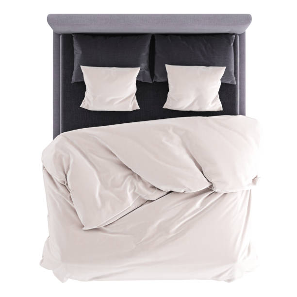 istock A double bed with soft fabric lilac upholstery and black and white linen on a white background. Top viev. 3d rendering 1199283714