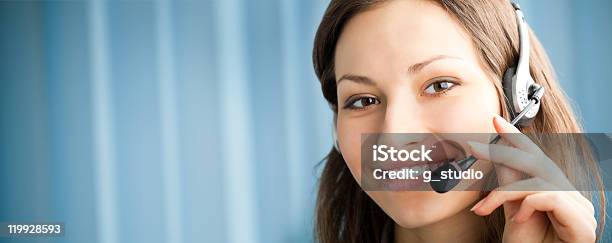 Portrait Of Support Phone Operator In Headset At Workplace Stock Photo - Download Image Now