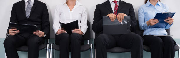istock Businesspeople Sitting On Chair 1199287164