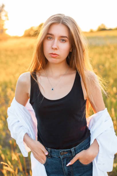 istock Young woman posing outdoors 1199288432