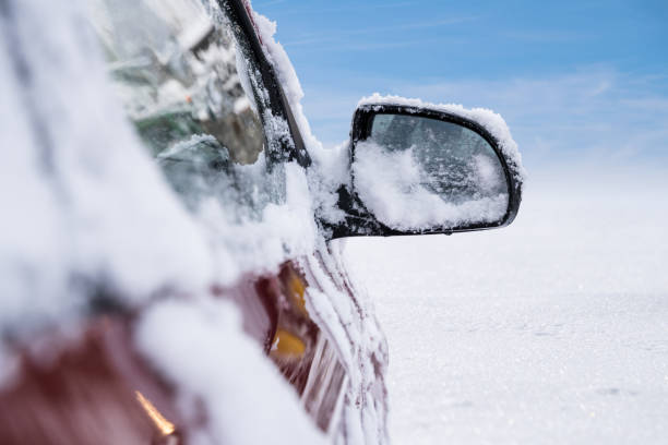 istock Car Mirror Covered With Snow 1199289146