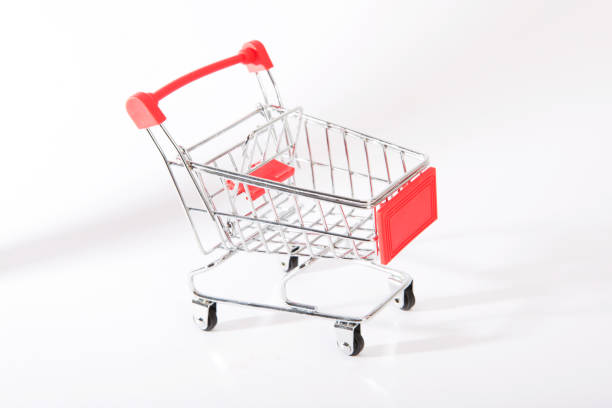 istock Small shopping cart on a white background 1199289281