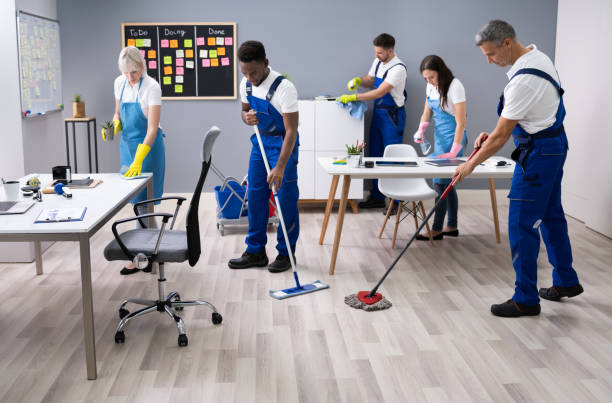 istock Happy Janitors Cleaning Office 1199289500