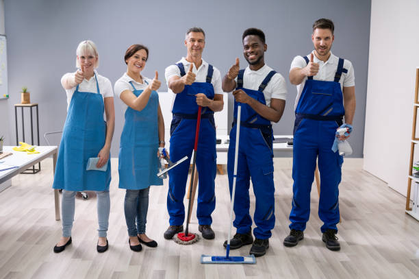 istock Janitors Showing Thumb Up Sign In The Office 1199289517