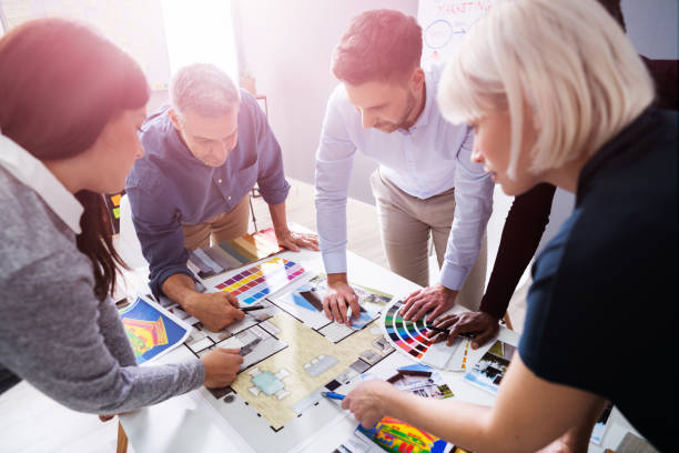 istock Designers Working On Color Selection For House 1199289837