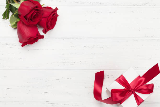 istock Valentines day card with gift and flowers 1199289904