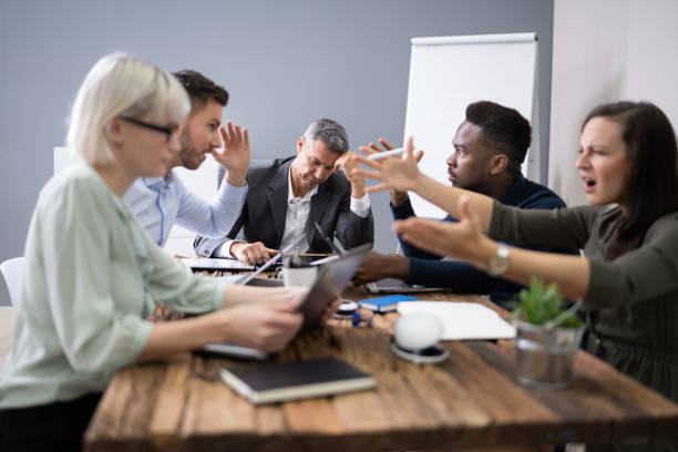 istock Business People Arguing In Meeting 1199291043