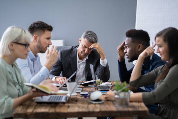 istock Business People Arguing In Meeting 1199291054