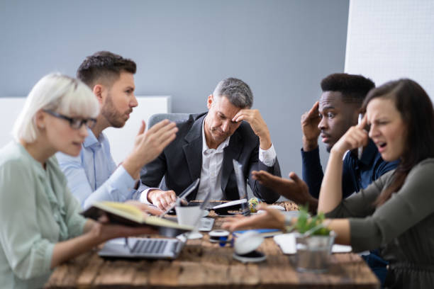 istock Business People Arguing In Meeting 1199291063