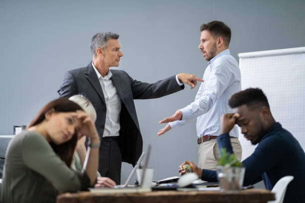 istock Two Male Colleagues Fighting In Office 1199291072