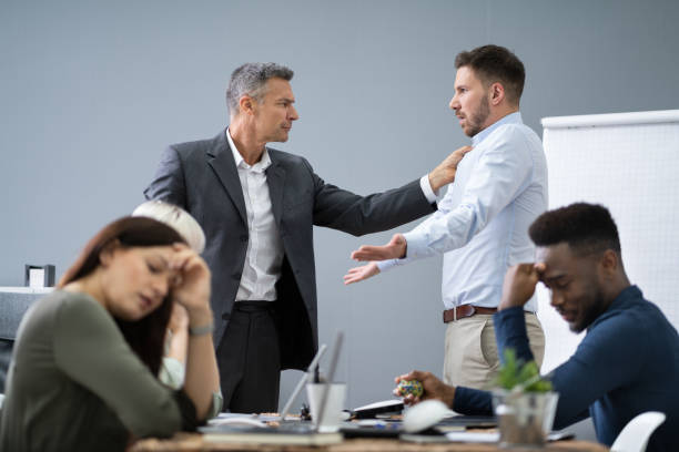 istock Two Male Colleagues Fighting In Office 1199291080