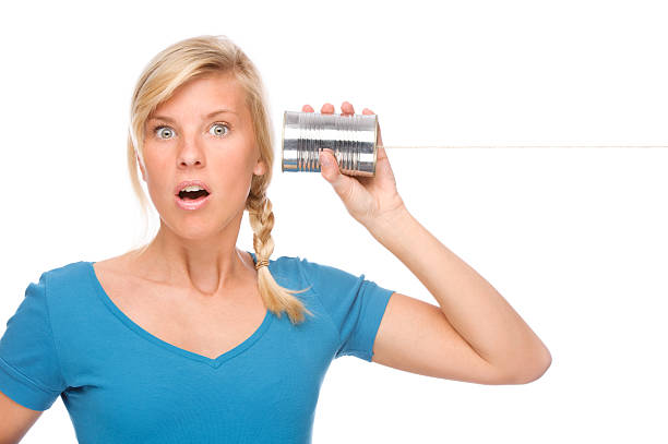 istock Woman with tin phone 119929232