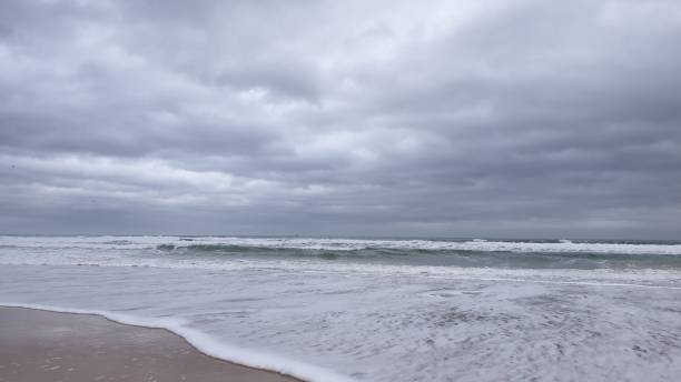 istock Stormy sky with sea on shore 1199293757