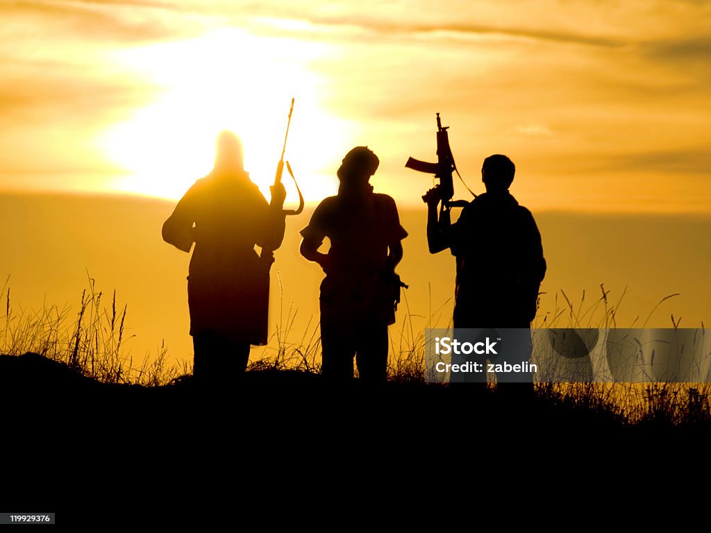Soldaten gegen Sonnenuntergang - Lizenzfrei Terrorismus Stock-Foto
