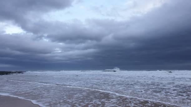 istock Stormy sky with sea on shore 1199293765