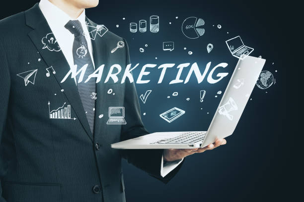 istock laptop with marketing sketch 1199293932