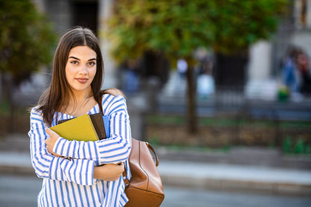 istock University student going to college. 1199299483