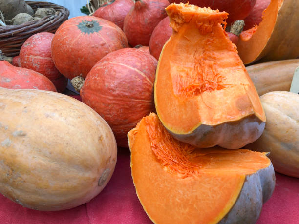 istock pumpkins and vegetables at a local market 1199302879