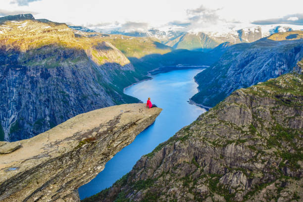istock The tourist on the Trolltunga, Norway. 1199303486