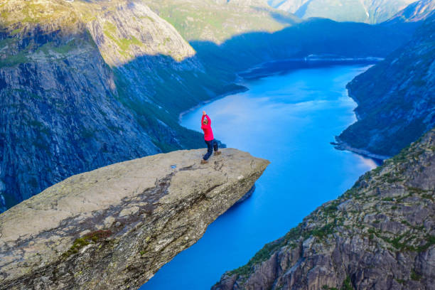 istock The tourist on the Trolltunga, Norway. 1199303494