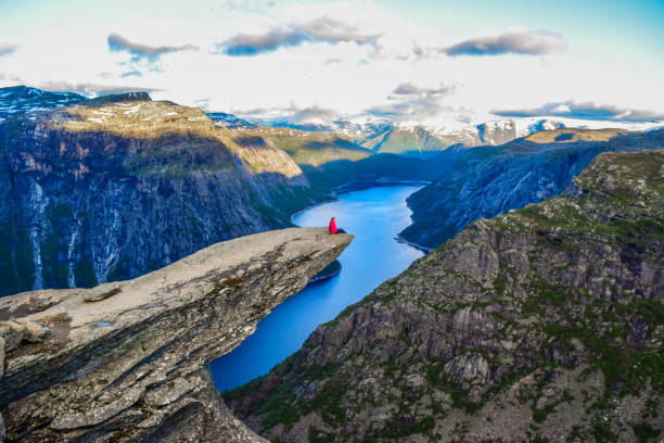 istock The tourist on the Trolltunga, Norway. 1199303540