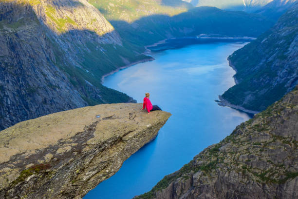 istock The tourist on the Trolltunga, Norway. 1199303627