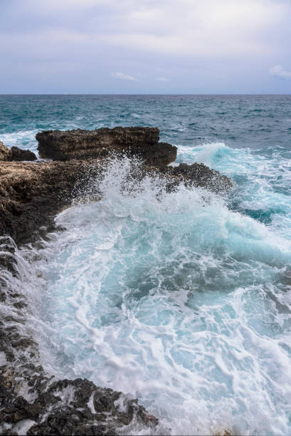 istock Rocky beach under a gloomy dramatic sky 1199304058