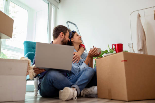 istock Couple moving in new apartment 1199304794