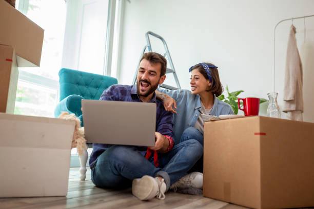 istock Couple searching for apartment redecoration ideas 1199304808