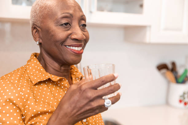 istock Enjoying Her Glass of Water 1199308967